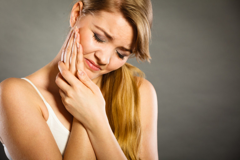 Причины боли после лечения зуба
