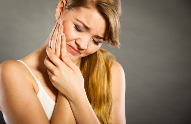 Причины боли после лечения зуба